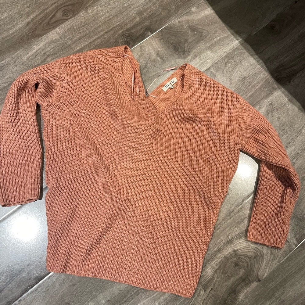 Light pink knit sweater with bow back